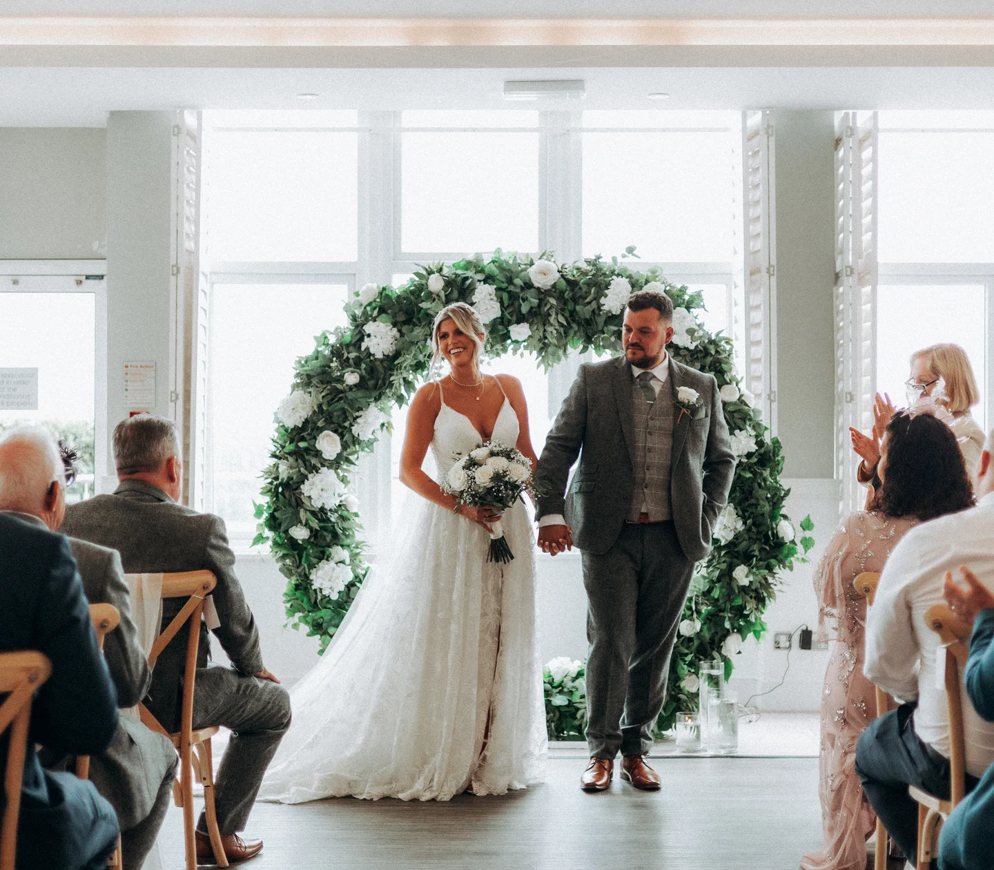 An indoor wedding ceremony with a sea view at Harbour Hotel St Ives